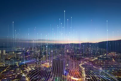 Futuristic cityscape with digital data lines representing technology and optimisation services.